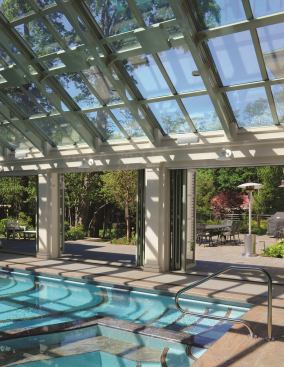 To make this New England home’s pool accessible all year long, architect Marcus Gleysteen outfitted it with an adaptable pool house that cleverly makes the most of every season thanks to folding glass walls and an operable glass roof. The pool itself is dressed up with glass mosaic tiles that form an abstract mural across the floor. Project: Brookline Pool House, Brookline, Mass.; Builder: Wellen Construction, Marlborough, Mass.; Architect: Marcus Gleysteen, Cambridge, Mass.