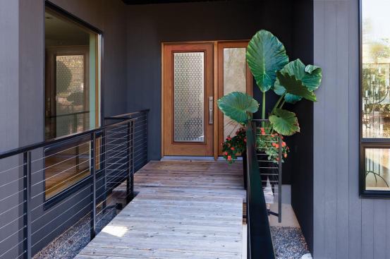 The Array door insert consists of two sliding panels of perforated, powder coated aluminum that allows users to control privacy and light levels. A turn of a knob moves the panels from open to close and variations in-between. It features low-E glass for energy efficiency. ODL. 
www.odl.com.