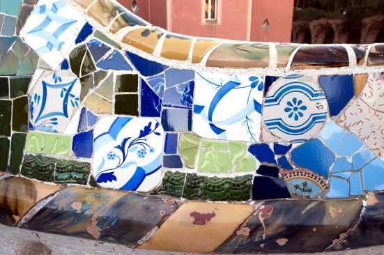 Handpainted kitchen tiles incorporated in the serpentine bench.