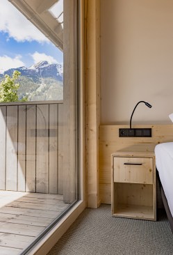 hotel room terrace / Every hotel room has a view on the mountain landscape.