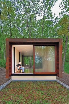 A green roof tops the lower level.