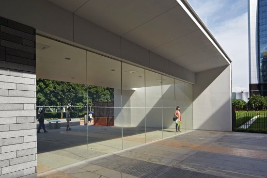 The gardens and paved areas are decidedly public in character.