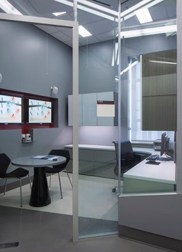 Offices+along+the+perimeter+have+glass+vision+panels+to+maximize+visual+connections+and+communication+throughout+the+facility%2c+while+admitting+daylight+into+circulation+spaces..