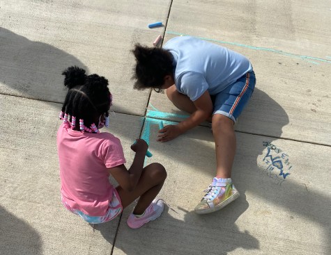 The port of Baltimore and the city skyline can be seen f off in the distance from the space.
