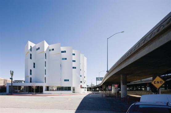 Alongside the Santa Monica Freeway, the New Carver Apartments brings color and form to an otherwise gritty part of downtown Los Angeles.