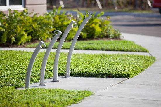 Bike Garden Bike Racks shown in surface mount configuration with Aluminum Texture powdercoat at Page Field, Fort Meyers, Florida