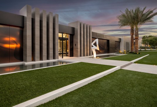 Serenity Indian Wells modern luxury home exterior architectural design with vertical columns & ribbon windows