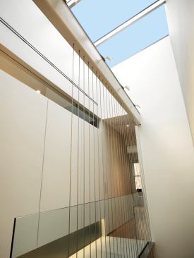 The skylight above the staircase is the centerpiece of the new construction as it welcomes light into a home that had been dark for more than a century.   2011 Remodeling Design Awards (September)  Whole-House Remodeling $250,000 – $500,000  Kube Architecture, Washington, D.C.