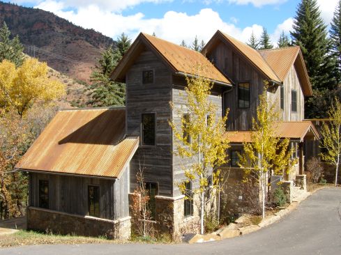 An old snow fence becomes beautiful Siding