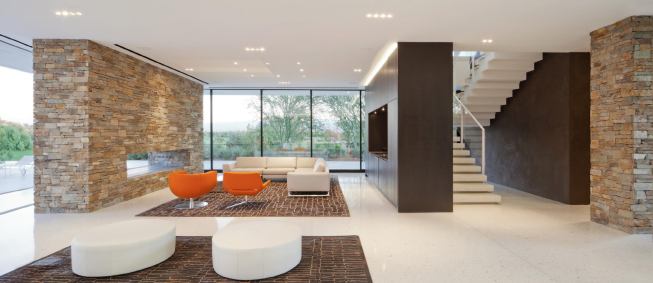 Terrazzo covers the first floor; terrazzo pavers line the cast concrete staircase.