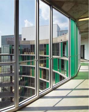 Transparency is an important facet of the project, fostering community by allowing each student to see the workspace and artwork of others living in the Gateway. The architects specified floor-to-ceiling Viraspan spandrel glass on the exterior and courtyard fa?ades of the drum.