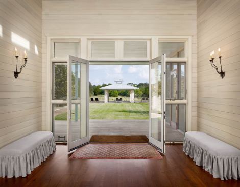 Almost out of site at the border between the manicured lawn and the wilder field beyond, the pool was conceived as a destination, rather than simply an amenity.