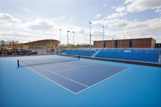Tennis courts at Eton Manor in the north of the Olympic Park looking toward the Velodrome.