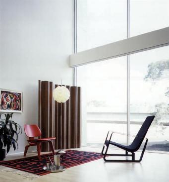 Interiors at the Titan feature double-height ceilings and spare, Modern detailing.