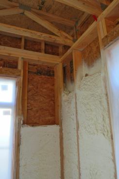 2x6 - 24" OC Stud walls are my preference for R-21 with 5.5" of foam
