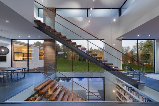 Walker Road modern home open central volume with floating stairs