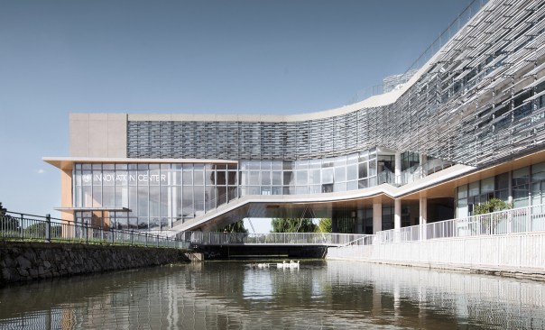 The building traverses over the river.