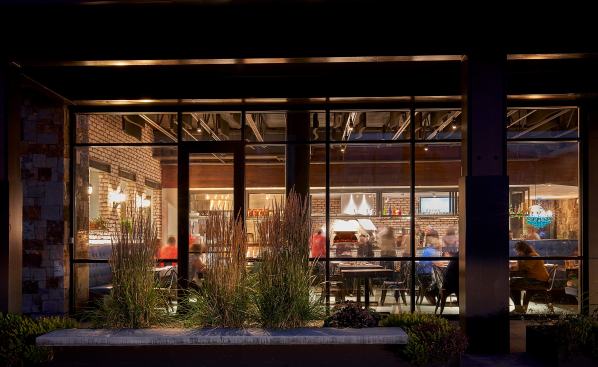 Brick restaurant is bustling in Steamboat Springs with views of Mt. Werner.