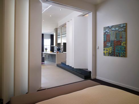 View from the master bedroom showing partitions mostly closed.