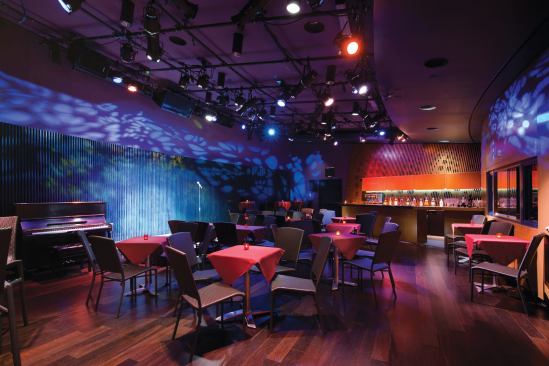 A new 75-person cabaret is located in the new addition that wraps the existing theater building. The addition was designed to accomodate this new venue, as well as offices and restrooms.