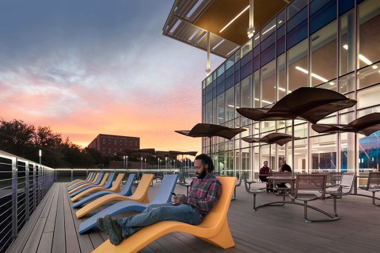 The ‘Boardwalk’ serves as a unique gathering space for this small-town campus and features a multi-purpose amphitheater-style classroom.