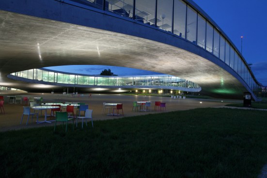 Rolex Learning Center, EPFL, Lausanne, Switzerland. Exterior view by night