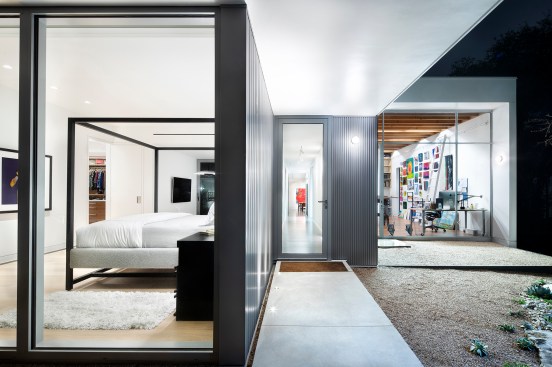 View from backyard to primary bedroom and painting studio