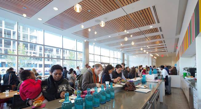 Daniels Spectrum is transparent to the street with a welcoming community-run cafe in the lobby.