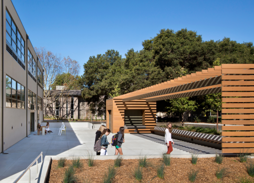The trellis and kiln shed define an outdoor studio.