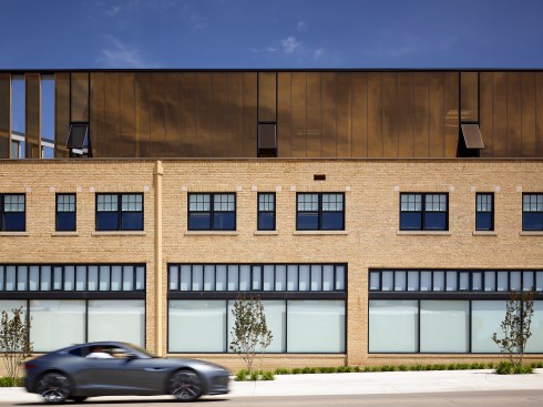 South elevation. At early dusk the building begins to glow.   