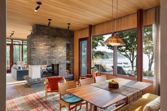 Living and dining with a two-sided fireplace