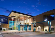 "A color palette of earth tones, drawn from the surrounding geography, seamlessly integrates the building into the natural environment."