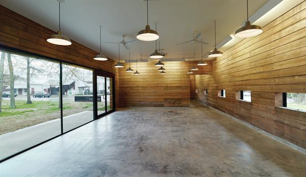At+the+center+of+the+plan+is+a+large%2c+open+meeting+room+that+can+be+used+for+town+gatherings+or+as+a+classroom.