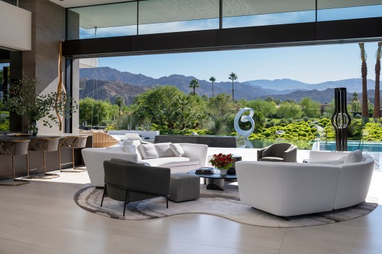Serenity Indian Wells luxury resort style home bright modern living room with sliding glass walls