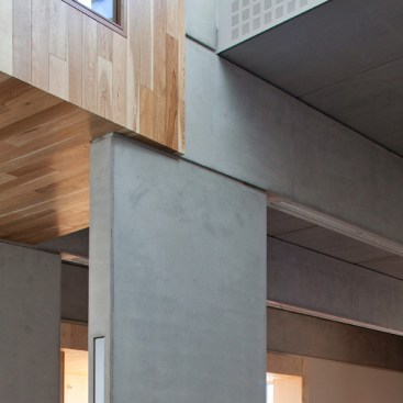 The+street+is+contained+on+one+side+by+a+timber+lining+denoting+the+public+elements+