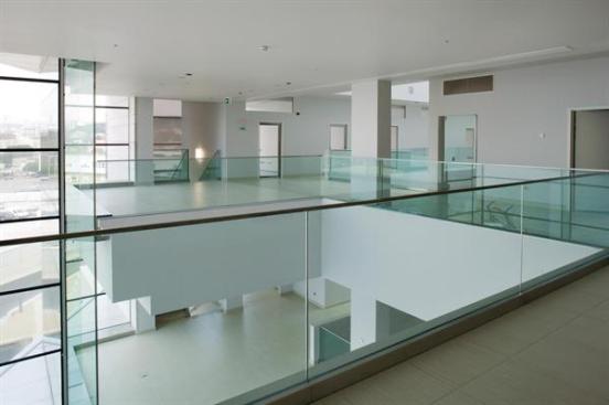 Inside the research building, double-height lobby spaces allow visitors to see into lab spaces, furthering the goal of opening the center to the community.