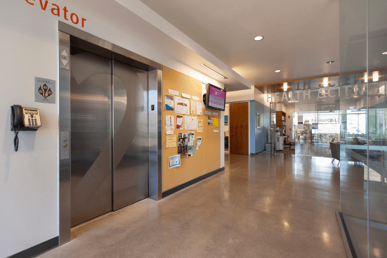 Stainless Steel Elevator Doors in Satin finish with custom Eco-Etch pattern at Clackamas Community College - Harmony Campus, Milwaukie, Oregon