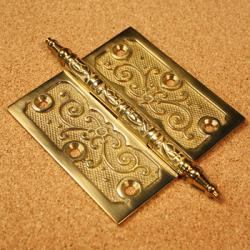 Decorative architectural pieces are overpowering in large doses, but used sparingly they can be dramatic. For $44, you get three of these fancy handmade 4-inch solid brass hinges. Pieces have a polished and lacquered brass finish. While you’re at it, get two sets. 
www.overstock.com.