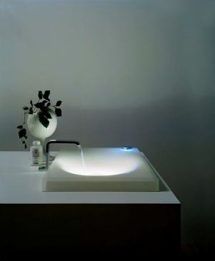 Toto USA  The Neorest II Luminist lavatory was possibly the coolest product to come out of the 2009 Kitchen and Bath Industry Show. It’s made from a hybrid epoxy resin that is commonly found in airplane wings, so it’s durable and scratch-resistant. Plus, the sink’s translucent quality is perfect for the optional embedded LED lighting, which glows blue, light purple, dark purple, and red. Prices range from $3,980 to $4,900. 
www.totousa.com.