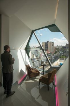 The manager of the store was so taken with the vantage points offered by the pods that he requested that one be used as a sitting area in his office.