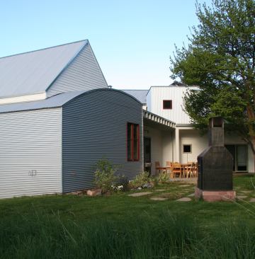 The owners planted native grasses and kept all but two of the trees from the orchard that once stood on the property.