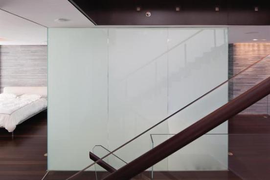 Electric privacy glass permits modesty at the touch of a switch