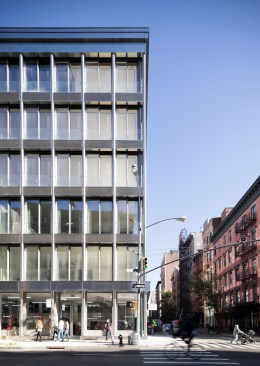 The six-story building is deferential to the pedestrian scale of the neighborhood while matching the height of adjacent structures.