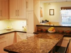 The manufacturer recycles wood chips to create this countertop surfacing and flooring product, called Orient. Available in eight standard and custom colors, the product contains no added urea formaldehyde and comes in slabs measuring 8 feet by 3 feet in three thicknesses. www.torzosurfaces.com.