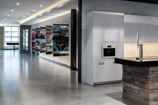 The conference center and model room, with its finished, buttoned-up look, offers panoramic views of the Potomac River and The Wharf and continues the story of PN Hoffman as the last development phase begins.