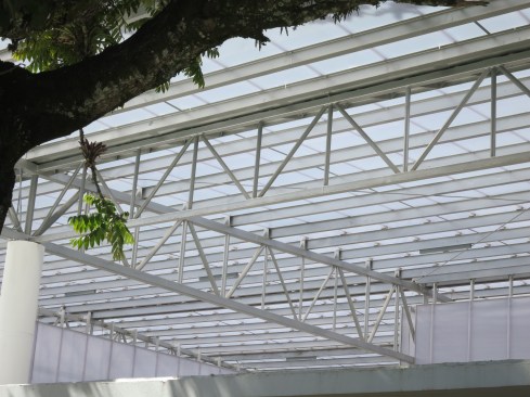Steel framed roof creates an all-weather gathering space
