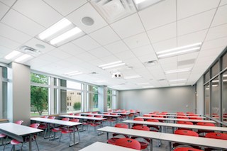 ROCKFON Tropic acoustic ceiling panels achieve an NRC of 0.85 with no upcharge. Installed in Chicago Metallic 4500 Ultraline heavy-duty bolt-slot suspension system, the ASU’s HSS building arrived at a cost-effective, complete ceiling system.