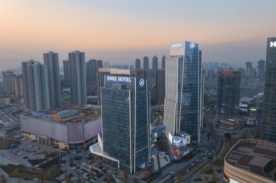 Multiple functions are organically interspersed with a shared corridor