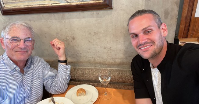 Betsky (left) and Quittenton (right) at a restaurant in Milan.