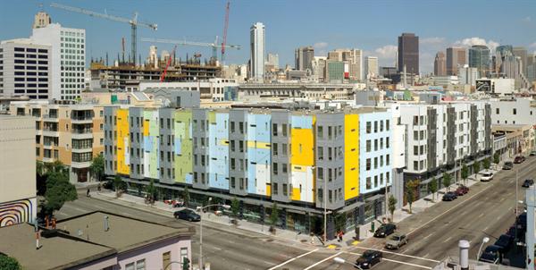 Color is a key component at Soma Studios and 8th + Howard Apartments. A bright geometric mural (left) gives the 8th Street elevation some punch.